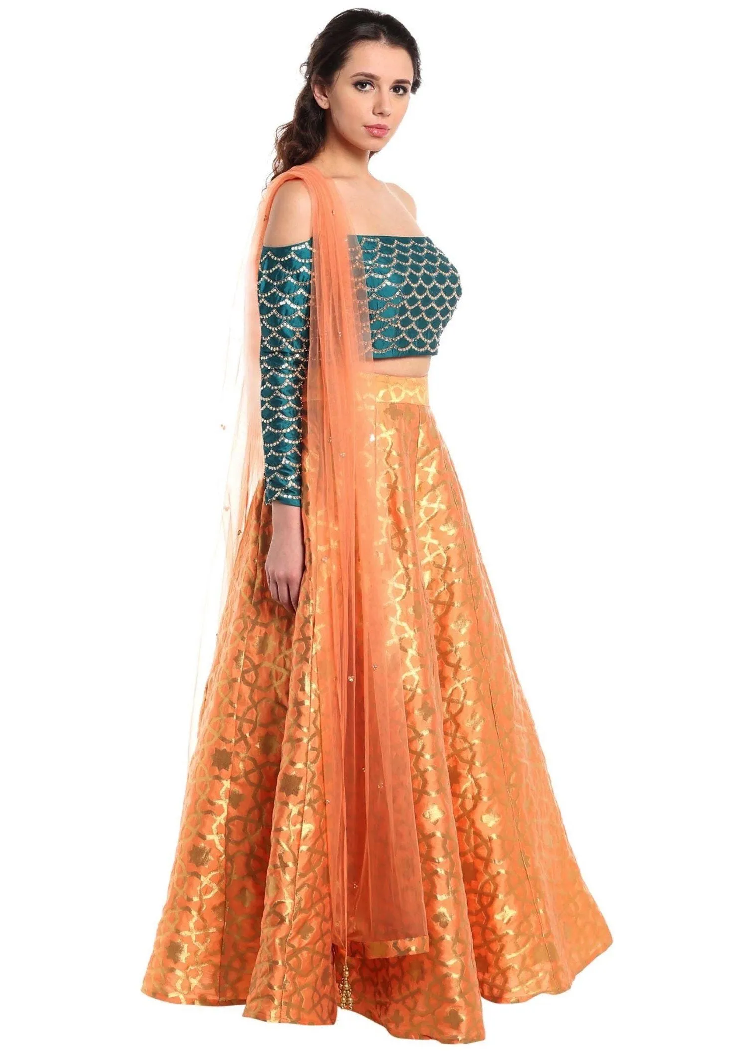 Dark peach lehenga with off shoulder teal blouse